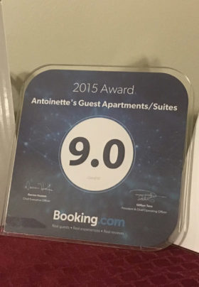 Bookings.com award plaque with a rating of 9.0