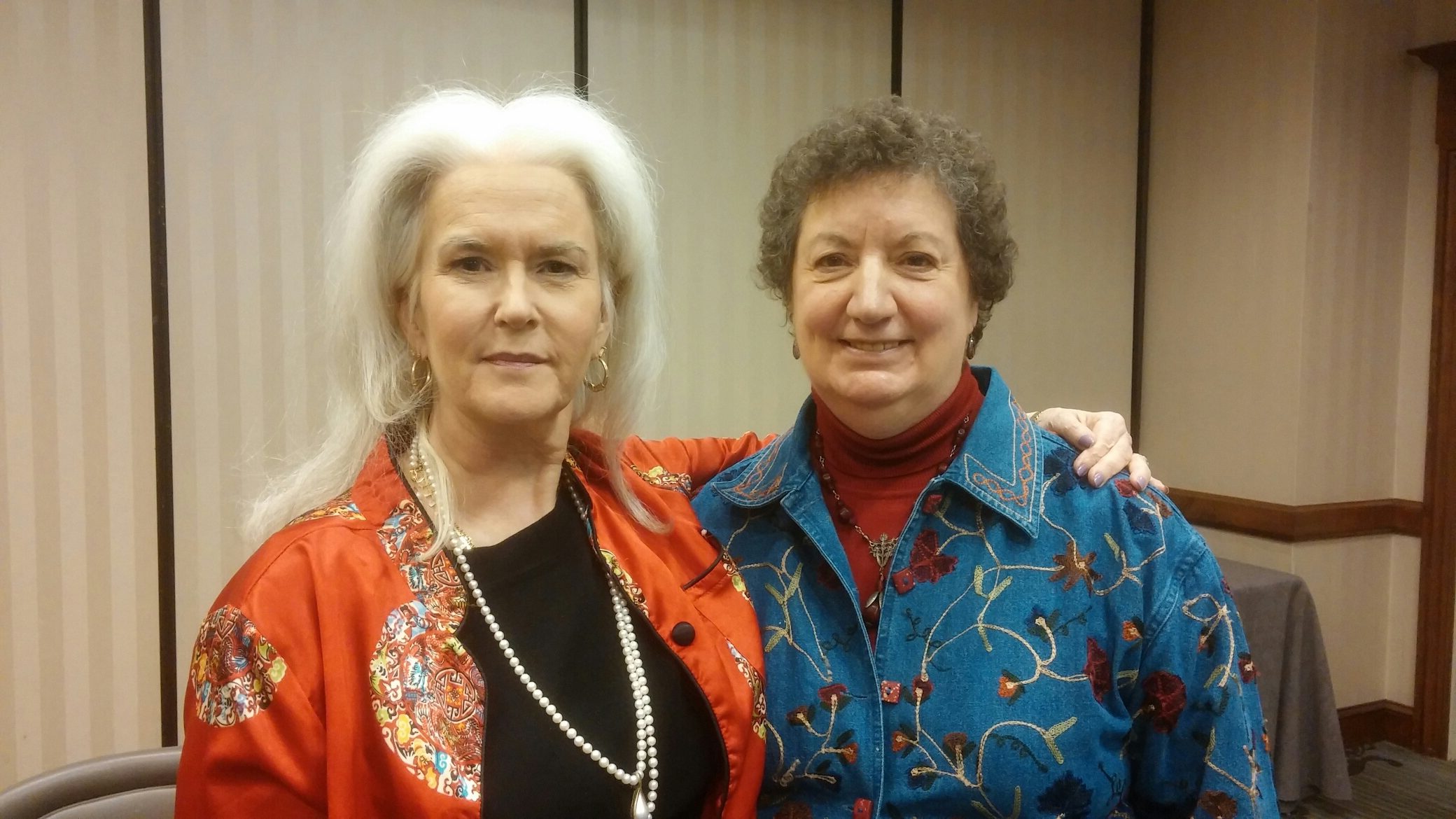 Owner Deanna Brown, woman with short brown hair and Heloise, woman with long white hair